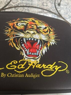 Ed Hardy by Christian Audigier tiger-print padded tablet or laptop sleeve.